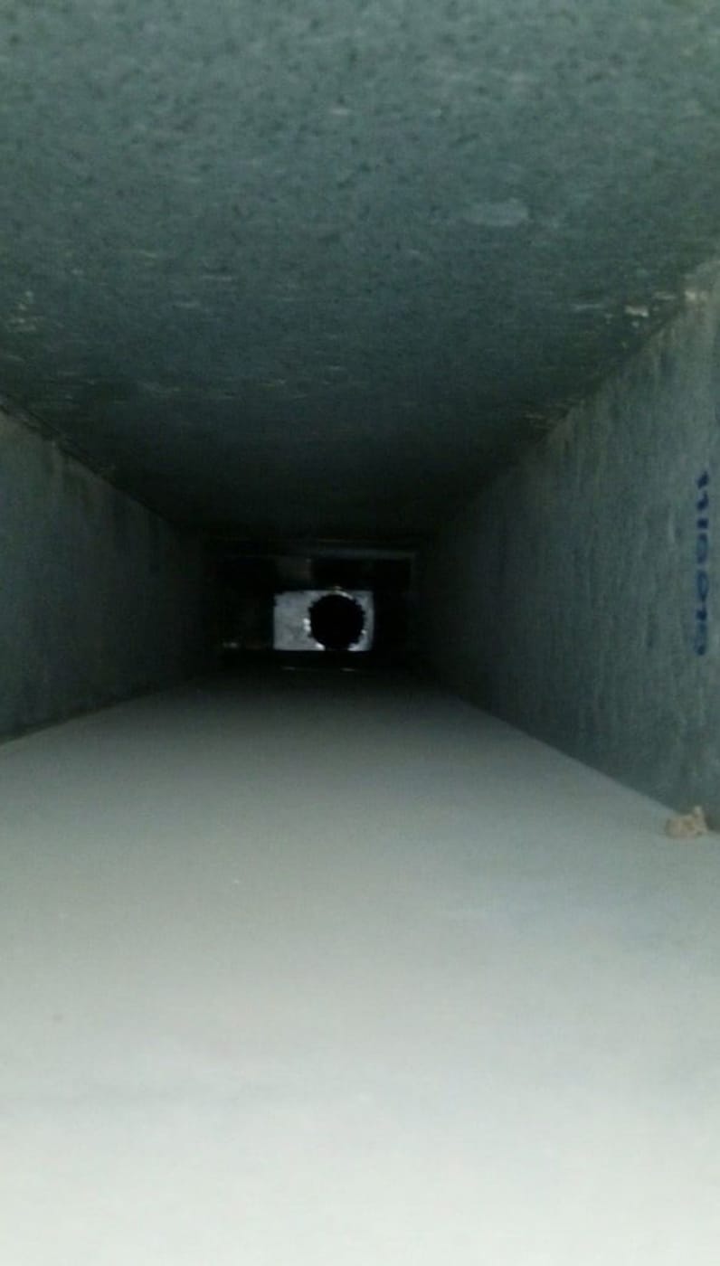Inside a duct, cleaned down to bare metal